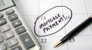 A calendar with the words mortgage payment written on it.